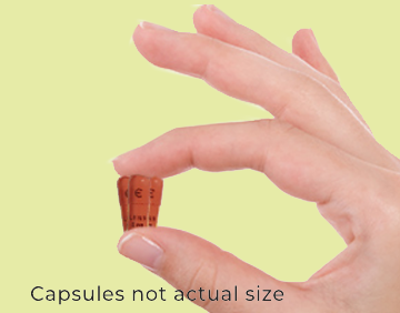 hand holding capsules